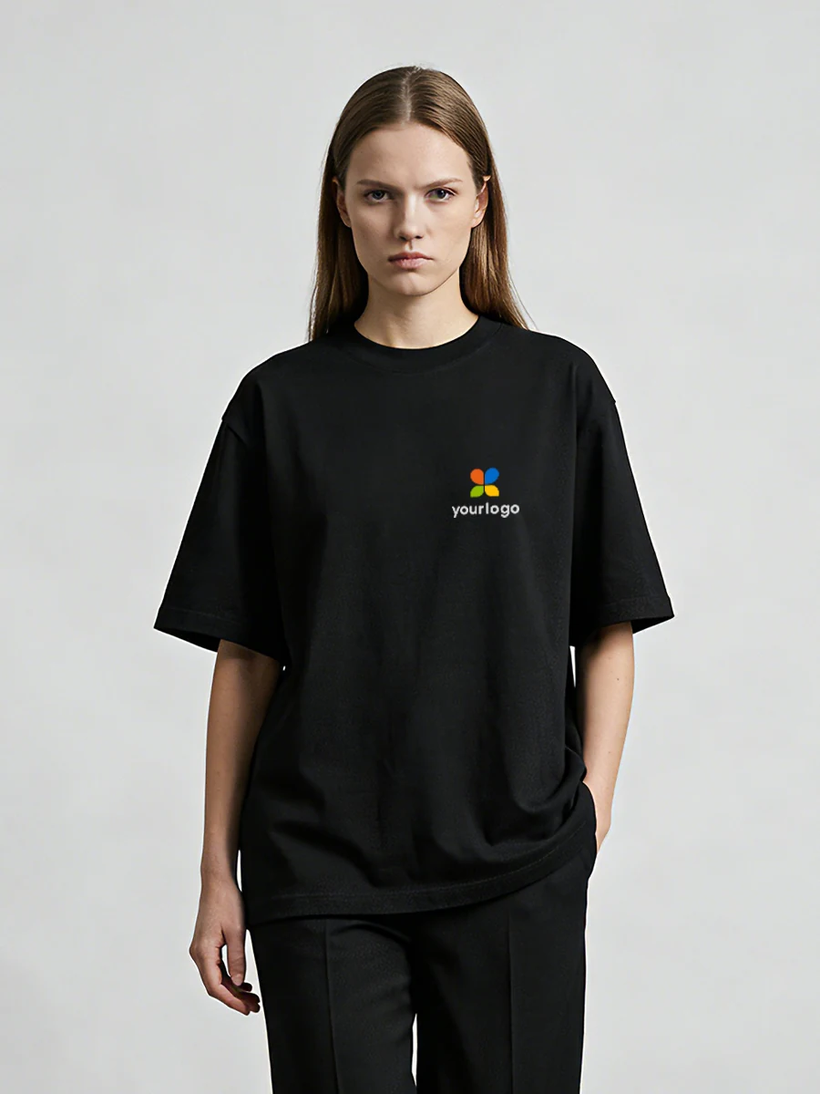 Woman wears a black techwear t-shirt with a vibrant rainbow logo, paired with black pants. Designed for daily commute, the moisture-wicking fabric features SORONA cooling technology, ensuring comfort and style. The image blends figurative art with modern brand aesthetics in bold black and colorful contrast.