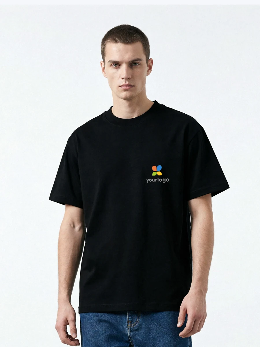 Man wears a black T-shirt with a vibrant rainbow logo, showcasing a custom T350 Black design. The detailed product photo highlights soft, skin-friendly fabric ideal for campus outfits and daily commuting. Computer graphics enhance the neogeo-style branding, emphasizing style and comfort in a sleek, modern look.